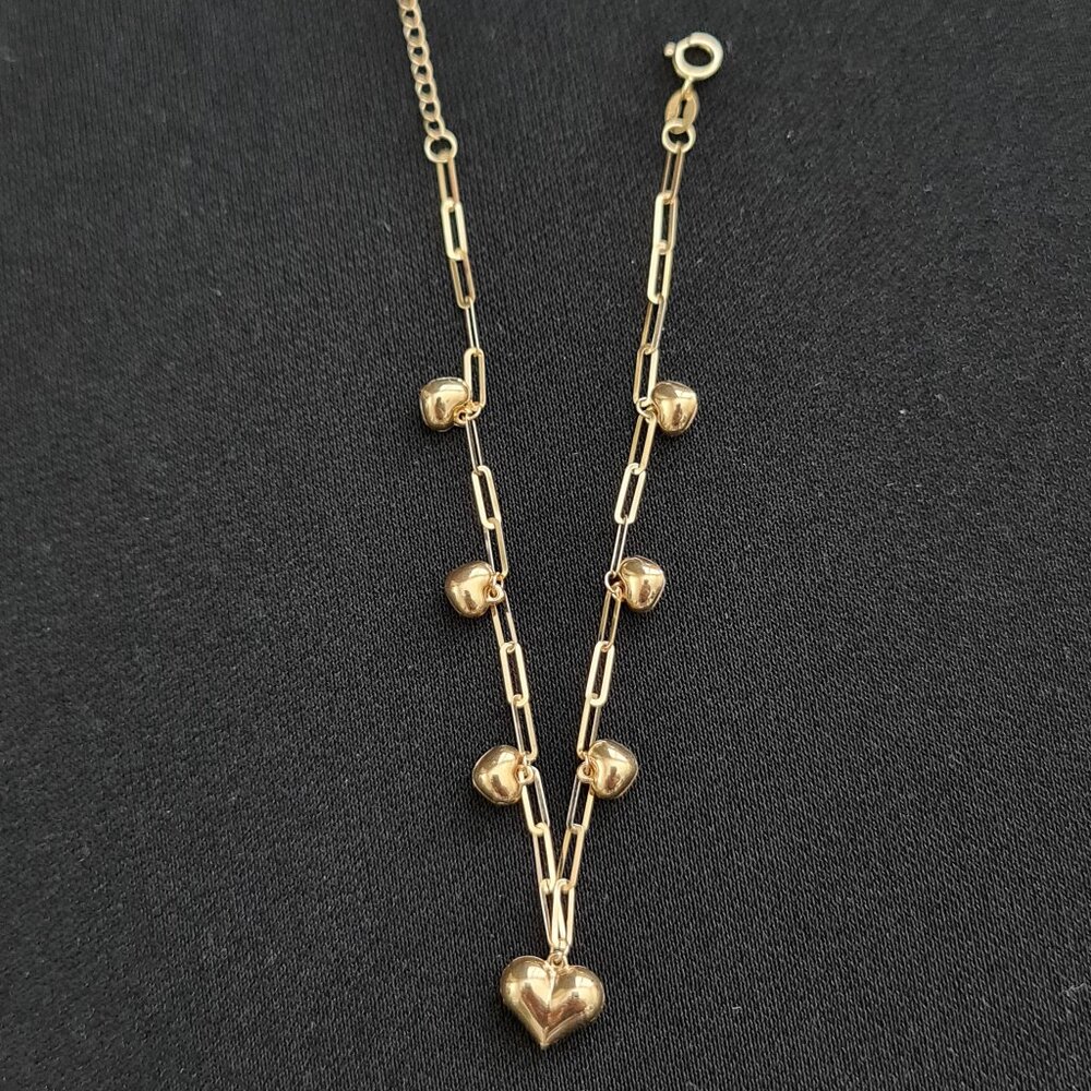 18k Bracelet with multiple small hearts charm